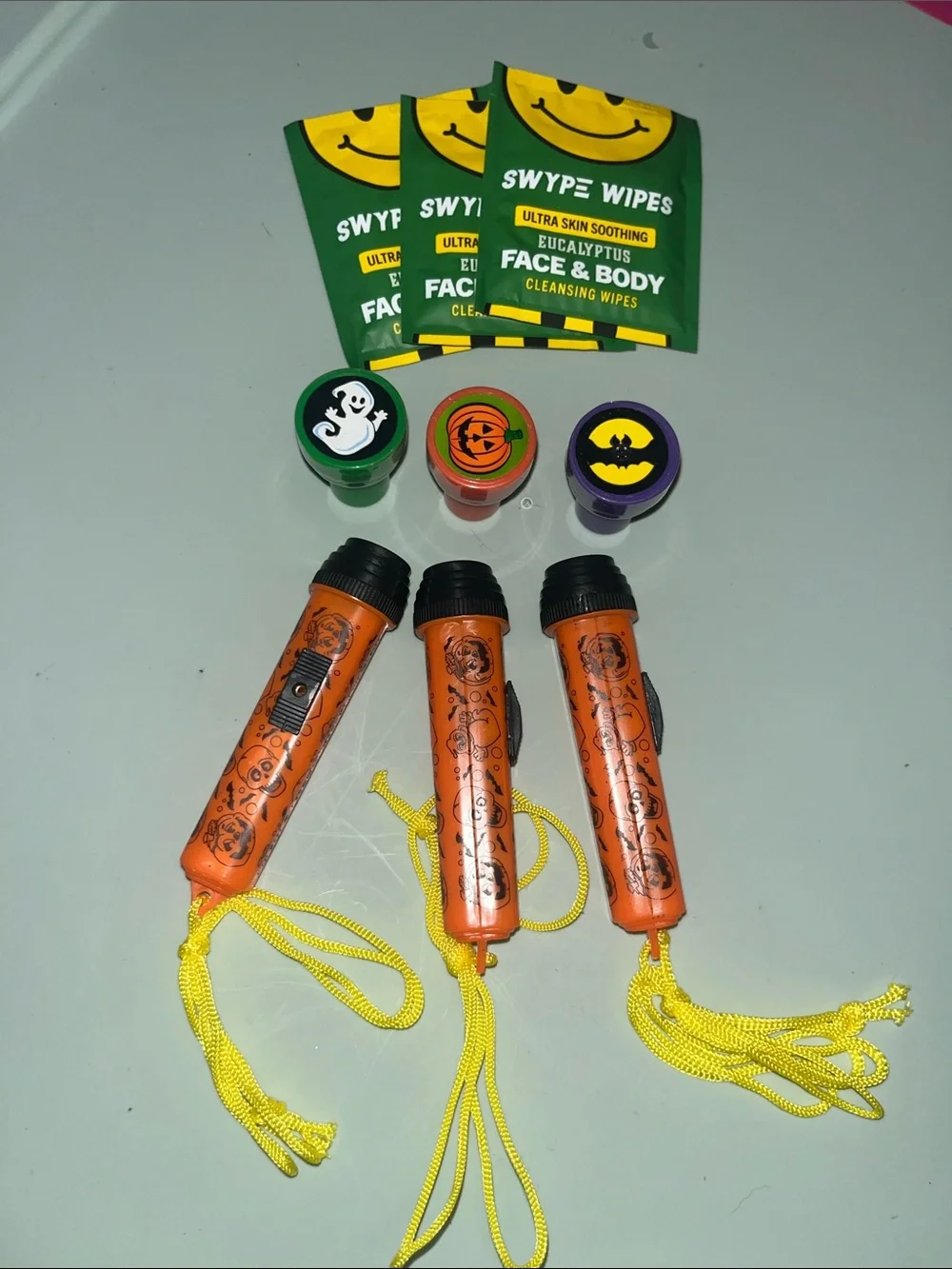 Halloween Orange Flashlight, Stampers and wipes Party Pack with Yellow Lanyards